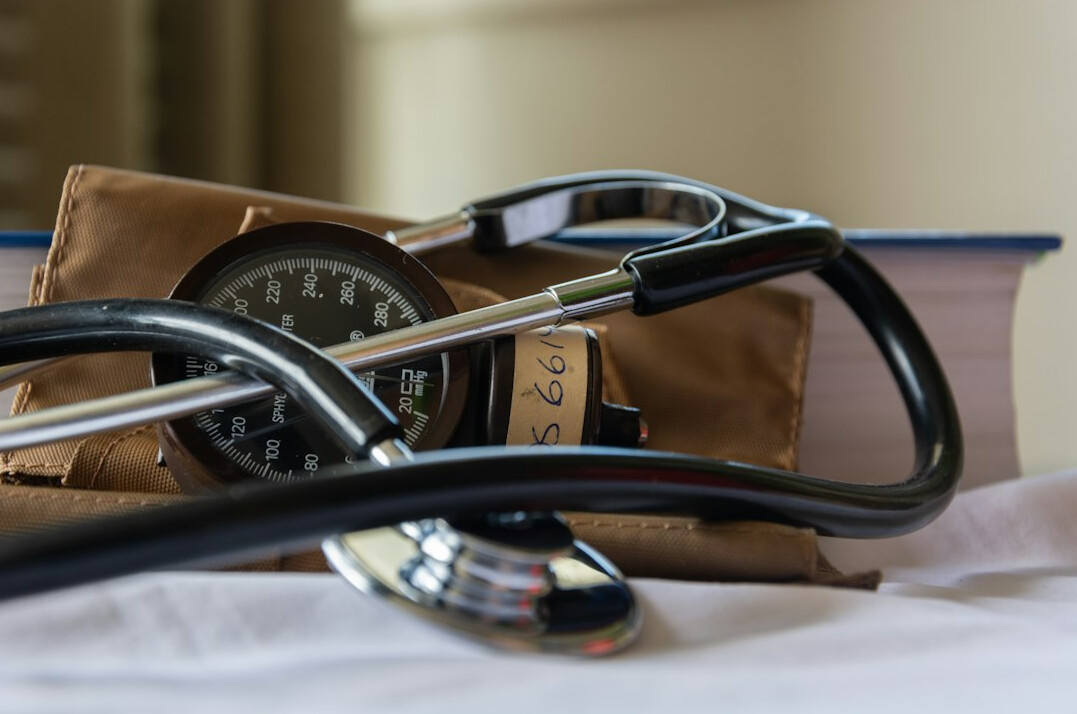 Stethoscope and medical notes on a desk